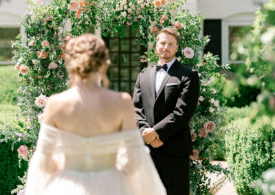 Bride walking down the aisle toward groom