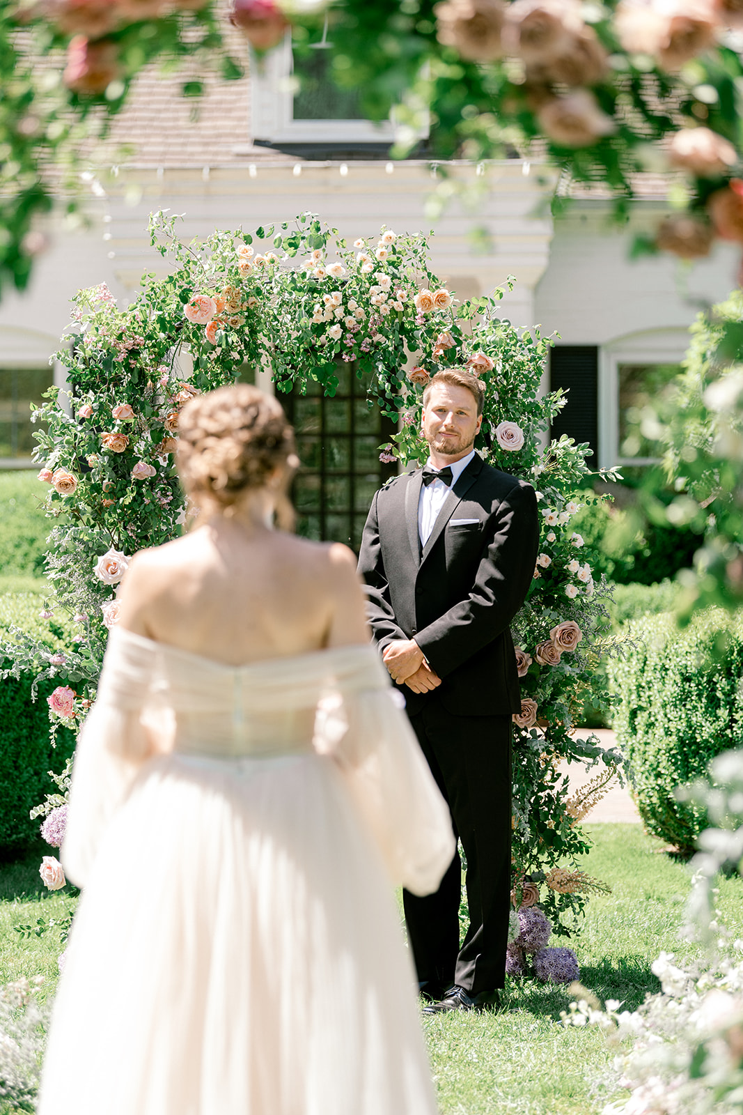 Bride walking down the aisle toward groom